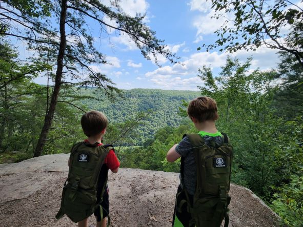 Killian and Jameson standing on the edge of Long Point Trail