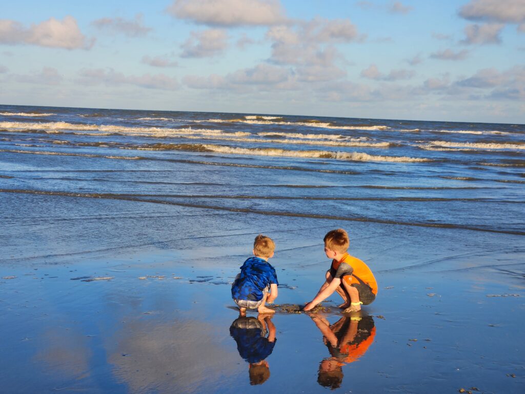 Kids playing on the beach at Galveston Texas